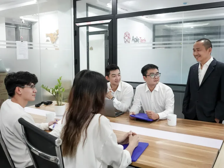 AgileTech Vietnam software development team collaborating in the Hanoi office